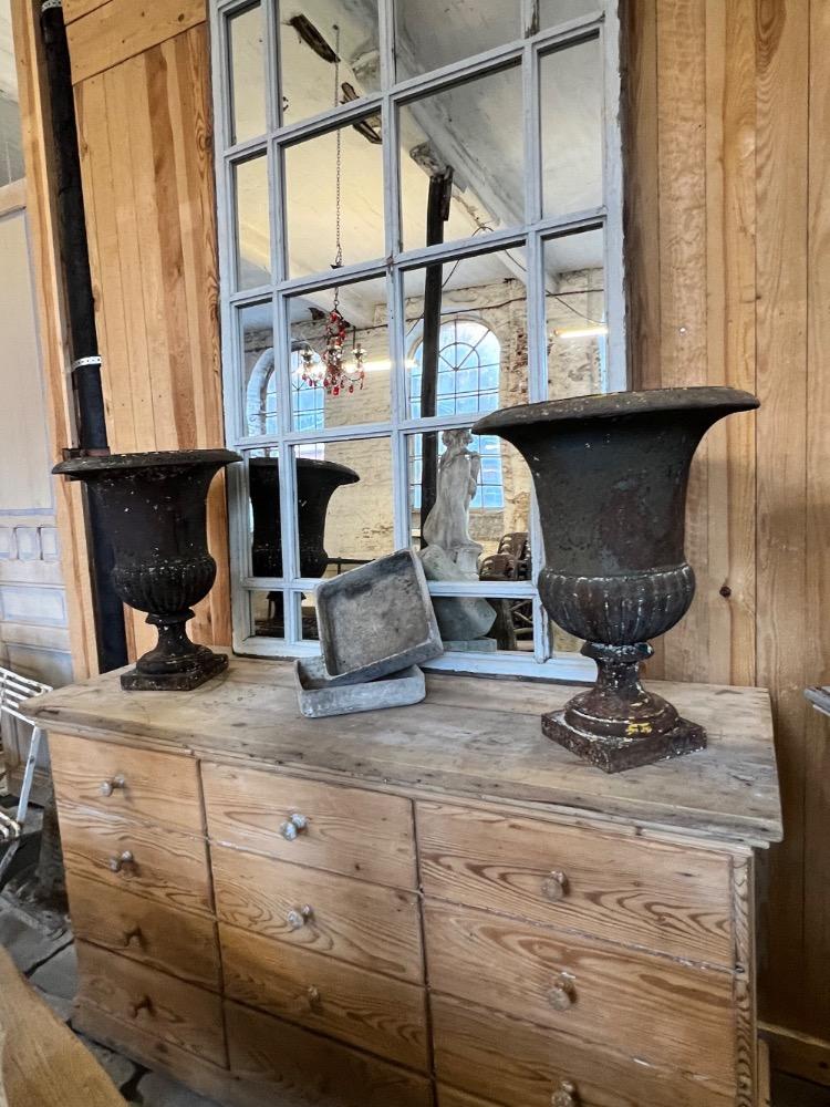 Pair of cast iron garden vases, 18th century