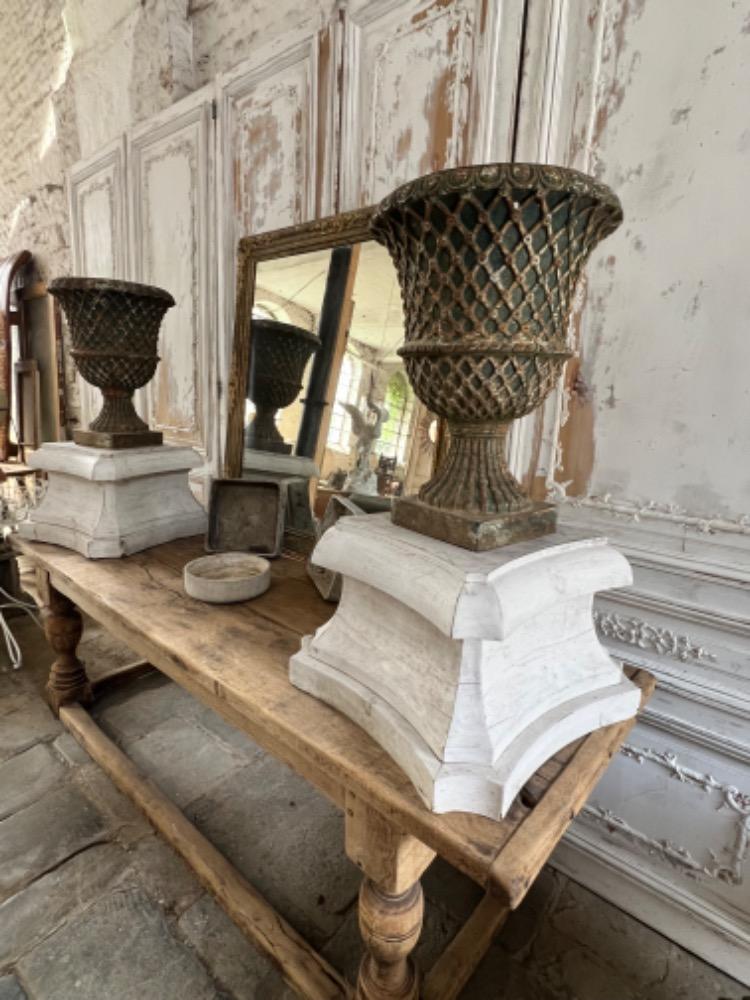 Pair of cast iron vases, late 19th century 