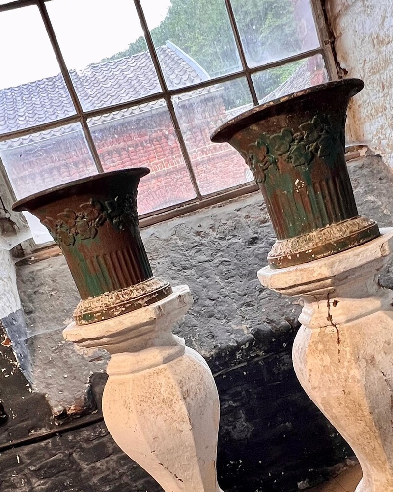 Pair of cast iron vases, late 19th century