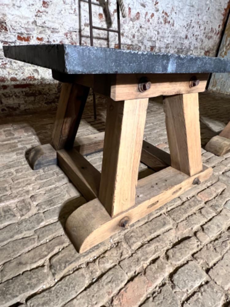 Pair of wooden and stone top tables, early 20th century 